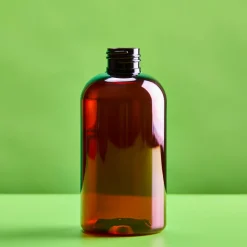 Nature's Garden 8 oz. Amber Boston Round Plastic Bottle Clearance